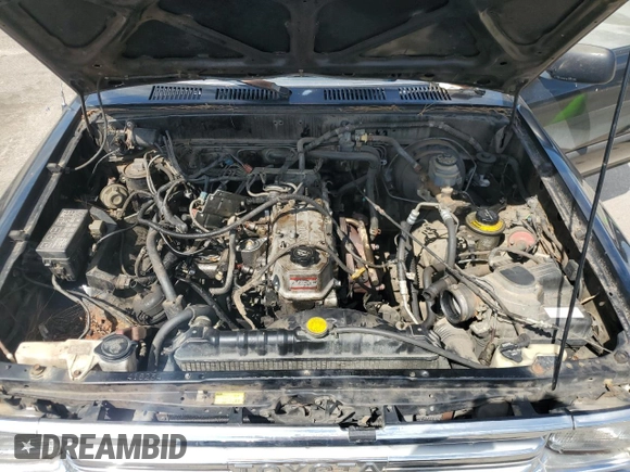 1990 Toyota Pickup DX с VIN JT4RN81P0L5083309, выставлен на аукционе Copart как лот 74438354 с пробегом 143 909 миль миль и Чистый • Clean title. История ставок и продаж доступна на DreamBid. Изображение 11.