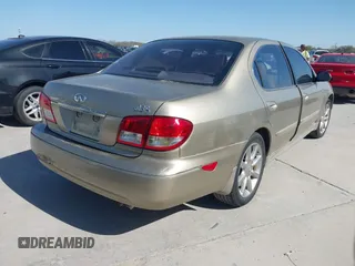 2002 Infiniti I35 Luxury with VIN JNKDA31A12T029546, listed as a IAAI auction lot 41853216 with 89,911 mi miles. Bid and sale history available at carsss.com. Image 4.