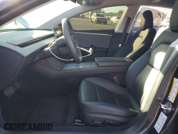 2024 Tesla Model 3 z VIN 5YJ3E1EA0RF736893, wystawiony jako Copart lot #85162464 z przebiegiem 8 479 mil mil oraz Szkoda całkowita • Salvage title. Historia ofert i sprzedaży dostępna na DreamBid. Obrazek 7.