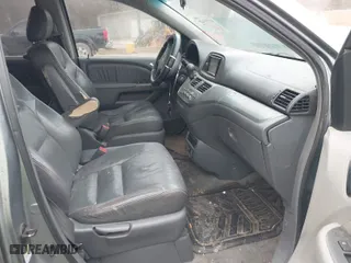 2005 Honda Odyssey EX-L with VIN 5FNRL38745B035909, listed as a IAAI auction lot 41717426 with 292,297 mi miles. Bid and sale history available at carsss.com. Image 5.