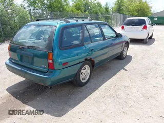 1997 Ford Escort LX with VIN 3FALP15P5VR126145, listed as a IAAI auction lot 42637921 with 148,109 mi miles and . Bid and sale history available at DreamBid. Image 4.