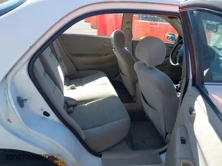 1998 Mazda 626 DX with VIN 1YVGF22CXW5702980, listed as a IAAI auction lot 41778063 with 104,672 mi miles. Bid and sale history available at carsss.com. Image 8.