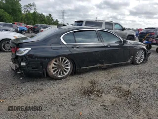 2017 BMW 7 Series 740i with VIN WBA7E2C50HG740358, listed as a Copart auction lot 51601995 with 0 mi miles and Non Repairable. Bid and sale history available at carsss.com. Image 3.