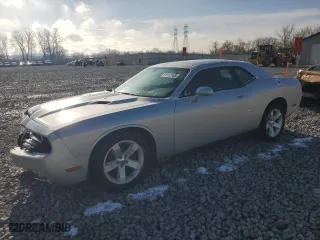 2012 Dodge Challenger SXT Plus with VIN 2C3CDYAG6CH139324, listed as a Copart auction lot 51912165 with 56,473 mi miles and Salvage Title. Bid and sale history available at carsss.com. Image 1.