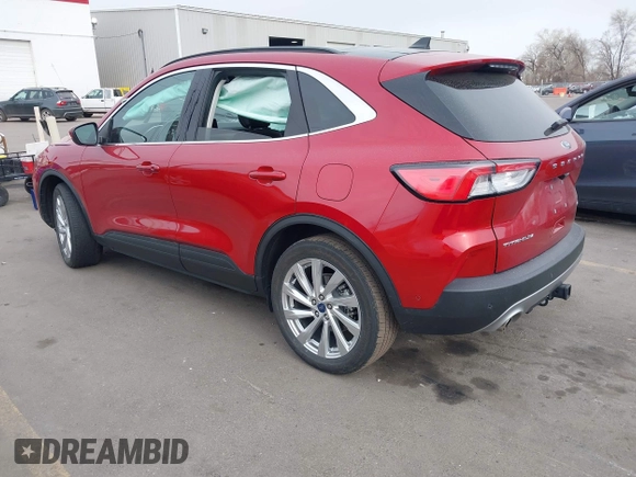 2021 Ford Escape Titanium Hybrid with VIN 1FMCU9DZ1MUA01599, listed as a IAAI auction lot 41912441 with 20,660 mi miles and . Bid and sale history available at DreamBid. Image 3.