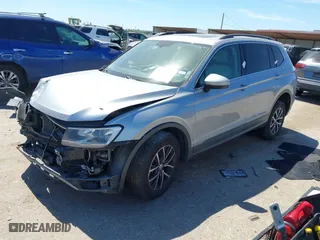 2019 Volkswagen Tiguan SE with VIN 3VV3B7AX5KM195140, listed as a IAAI auction lot 41803748 with 116,898 mi miles. Bid and sale history available at carsss.com. Image 2.