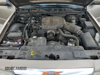 2004 Mercury Grand Marquis LS Premium z VIN 2MEFM75W14X689346, wystawiony jako Copart lot #52676325 z przebiegiem 127 676 mil mil oraz Szkoda całkowita • Salvage title. Historia ofert i sprzedaży dostępna na DreamBid. Obrazek 12.