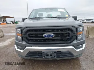 2023 Ford F-150 XL with VIN 1FTMF1C58PKF77242, listed as a IAAI auction lot 41559887 with 25,576 mi miles and . Bid and sale history available at carsss.com. Image 12.