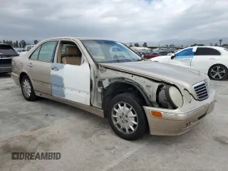 2001 Mercedes-Benz E-Class with VIN WDBJF65J01B251208, listed as a Copart auction lot 47550795 with 228,392 mi miles and Salvage Title. Bid and sale history available at carsss.com. Image 4.