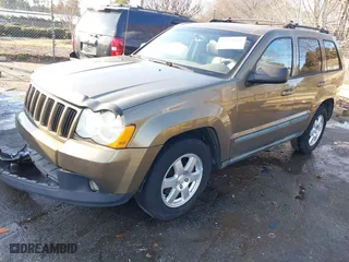 2009 Jeep Grand Cherokee Laredo with VIN 1J8GS48K79C516320, listed as a IAAI auction lot 41353131 with 166,739 mi miles. Bid and sale history available at carsss.com. Image 17.