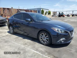 2015 Mazda 3 i Grand Touring with VIN 3MZBM1W7XFM135576, listed as a Copart auction lot 54060755 with 137,374 mi miles and Salvage title. Bid and sale history available at DreamBid. Image 4.