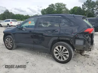 2021 Toyota RAV4 XLE Premium with VIN 2T3C1RFV9MW162776, listed as a Copart auction lot 55336675 with 79,060 mi miles and Salvage title. Bid and sale history available at DreamBid. Image 2.