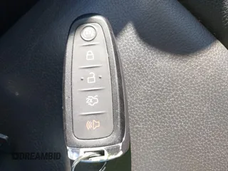 2015 Ford Escape Titanium with VIN 1FMCU9JX6FUB86304, listed as a IAAI auction lot 41595761 with 104,317 mi miles and . Bid and sale history available at DreamBid. Image 11.