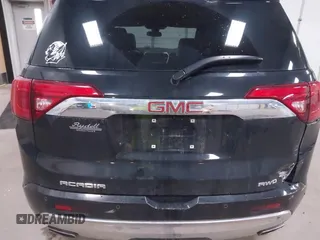 2019 GMC Acadia Denali with VIN 1GKKNXLS0KZ112252, listed as a IAAI auction lot 42293931 with 52,636 mi miles and . Bid and sale history available at DreamBid. Image 16.