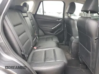 2016 Mazda CX-5 Grand Touring with VIN JM3KE4DY5G0691013, listed as a Copart auction lot 44700235 with 106,097 mi miles and Clean Title. Bid and sale history available at carsss.com. Image 11.