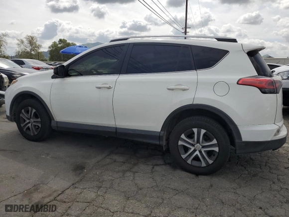2018 Toyota RAV4 LE with VIN JTMBFREV9JD256759, listed as a Copart auction lot 51165835 with 128,253 mi miles and Salvage Title. Bid and sale history available at carsss.com. Image 2.