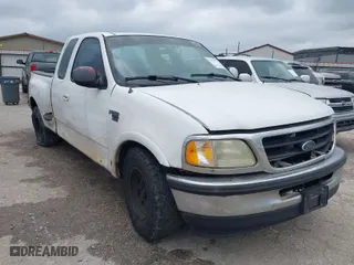 2002 Ford F-150 XL with VIN 1FTRX07262KB49014, listed as a IAAI auction lot 41518904 with 1 mi miles. Bid and sale history available at carsss.com. Image 1.