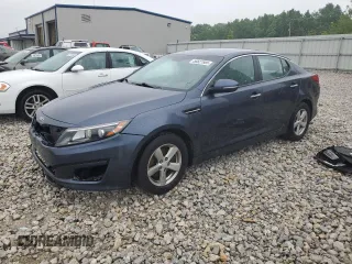 2015 Kia Optima LX z VIN KNAGM4A76F5575203, wystawiony jako Copart lot #58827985 z przebiegiem 115 259 mil mil oraz Czysty tytuł • Clean title. Historia ofert i sprzedaży dostępna na DreamBid. Obrazek 1.
