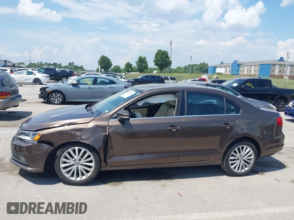 2015 Volkswagen Jetta SE with VIN 3VWD07AJ0FM214295, listed as a IAAI auction lot 42593549 with 62,720 mi miles and . Bid and sale history available at DreamBid. Image 13.
