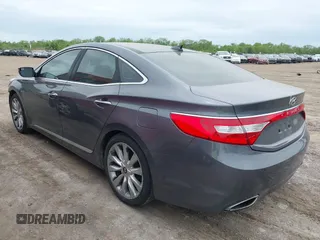 2013 Hyundai Azera z VIN KMHFH4JGXDA323375, wystawiony jako IAAI lot #42221412 z przebiegiem 111 244 mil mil oraz . Historia ofert i sprzedaży dostępna na DreamBid. Obrazek 3.