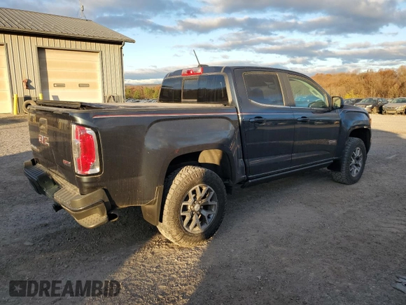2020 GMC Canyon 4WD All Terrain w/Cloth with VIN 1GTG6FEN0L1173679, listed as a Copart auction lot 79684354 with 58,901 mi miles and Salvage Title. Bid and sale history available at carsss.com. Image 3.