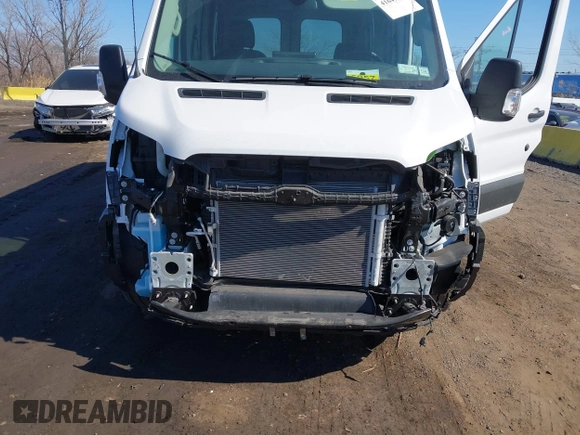 2023 Ford Transit z VIN 1FTYE2C84PKB90935, wystawiony jako IAAI lot #41649489 z przebiegiem 3 272 mil mil oraz . Historia ofert i sprzedaży dostępna na DreamBid. Obrazek 6.
