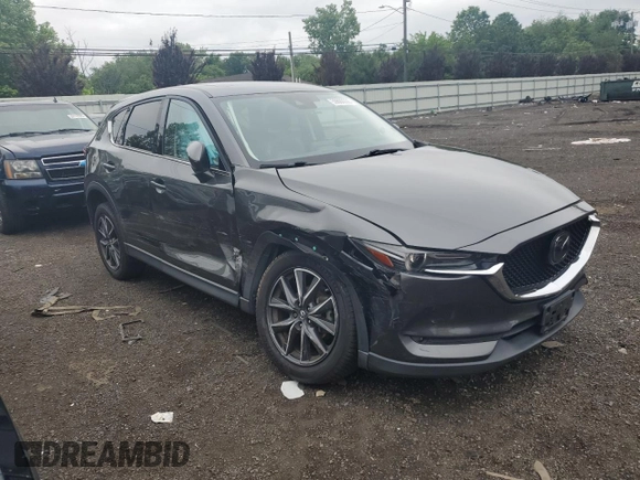 2018 Mazda CX-5 Grand Touring с VIN JM3KFBDM8J0424633, выставлен на аукционе Copart как лот 59888035 с пробегом 77 721 миль миль и Списание • Salvage title. История ставок и продаж доступна на DreamBid. Изображение 4.