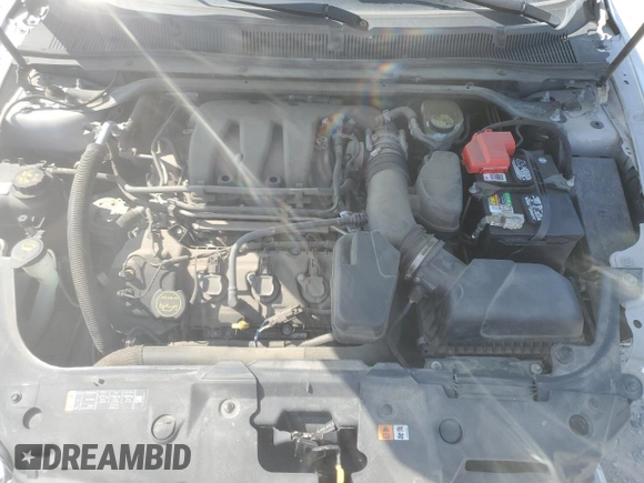2015 Ford Taurus SEL with VIN 1FAHP2E80FG121013, listed as a Copart auction lot 59940235 with 209,632 mi miles and Clean title. Bid and sale history available at DreamBid. Image 11.