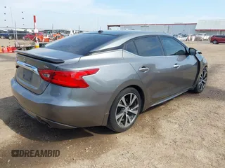 2016 Nissan Maxima SL z VIN 1N4AA6AP3GC392390, wystawiony jako IAAI lot #42260676 z przebiegiem 135 259 mil mil oraz . Historia ofert i sprzedaży dostępna na DreamBid. Obrazek 4.