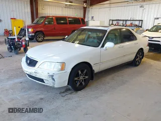 1999 Acura RL with VIN JH4KA9661XC007276, listed as a IAAI auction lot 41686607 with 249,992 mi miles. Bid and sale history available at carsss.com. Image 2.