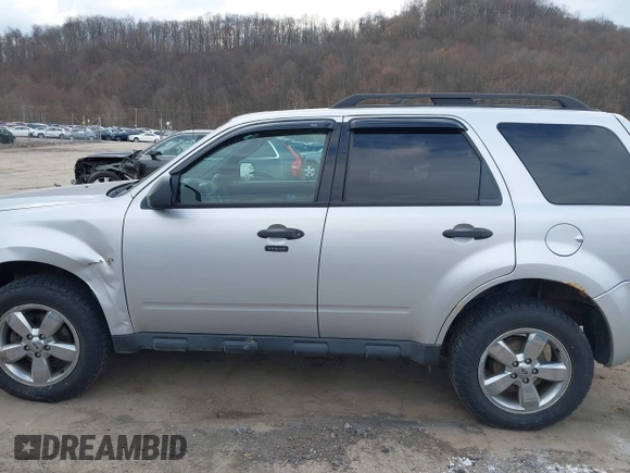 2012 Ford Escape XLT with VIN 1FMCU9DG1CKB76704, listed as a IAAI auction lot 41863525 with 176,104 mi miles and . Bid and sale history available at DreamBid. Image 14.