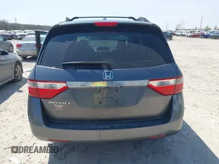 2012 Honda Odyssey EX-L with VIN 5FNRL5H69CB047425, listed as a IAAI auction lot 42064979 with 242,409 mi miles and . Bid and sale history available at carsss.com. Image 17.