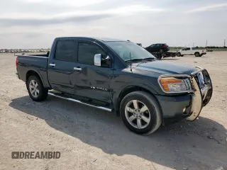 2013 Nissan Titan Pro-4X with VIN 1N6BA0EC3DN310741, listed as a Copart auction lot 57171975 with 146,524 mi miles and Salvage title. Bid and sale history available at DreamBid. Image 4.