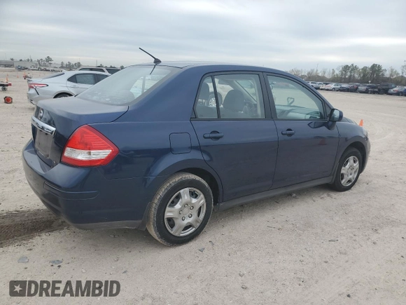 2009 Nissan Versa 1.8 S with VIN 3N1BC11E49L500200, listed as a Copart auction lot 87227464 with 215,170 mi miles and Salvage Title. Bid and sale history available at carsss.com. Image 3.