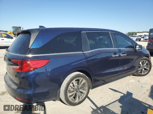 2022 Honda Odyssey Touring with VIN 5FNRL6H82NB039189, listed as a Copart auction lot 48883375 with 63,770 mi miles and Salvage Title. Bid and sale history available at DreamBid. Image 3.