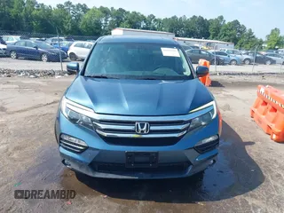 2018 Honda Pilot EX-L with VIN 5FNYF6H52JB050535, listed as a IAAI auction lot 42576721 with 99,280 mi miles and . Bid and sale history available at DreamBid. Image 12.