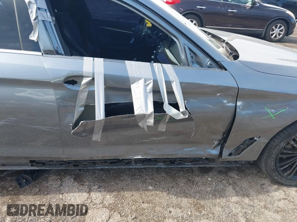 2018 BMW 5 Series 530i xDrive z VIN WBAJA7C59JWC74703, wystawiony jako IAAI lot #41811761 z przebiegiem 54 649 mil mil oraz . Historia ofert i sprzedaży dostępna na DreamBid. Obrazek 6.