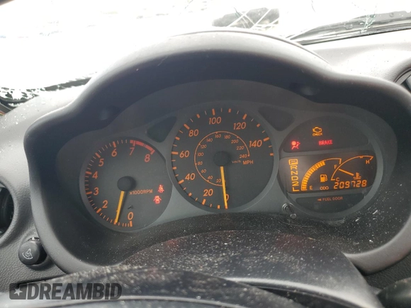 2003 Toyota Celica GT z VIN JTDDR32T730157268, wystawiony jako Copart lot #68884804 z przebiegiem 209 728 mil mil oraz Nie do naprawy • Non repairable. Historia ofert i sprzedaży dostępna na DreamBid. Obrazek 9.