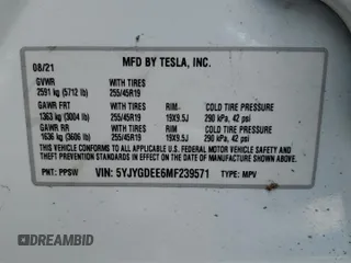 2021 Tesla Model Y Long Range z VIN 5YJYGDEE6MF239571, wystawiony jako Copart lot #56433595 z przebiegiem 58 471 mil mil oraz Szkoda całkowita • Salvage title. Historia ofert i sprzedaży dostępna na DreamBid. Obrazek 14.