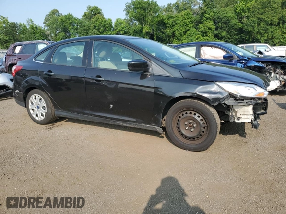 2012 Ford Focus SE with VIN 1FAHP3F22CL455790, listed as a Copart auction lot 60493005 with 100,081 mi miles and Salvage title. Bid and sale history available at DreamBid. Image 4.