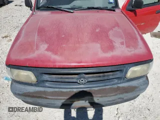 1994 Mazda B-Series Truck z VIN 4F4CR12AXRTN07635, wystawiony jako Copart lot #66788284 z przebiegiem 255 020 mil mil oraz Szkoda całkowita • Salvage title. Historia ofert i sprzedaży dostępna na DreamBid. Obrazek 12.