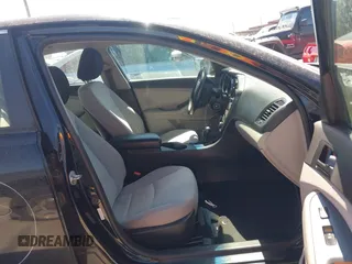 2013 Kia Optima LX with VIN 5XXGM4A75DG149949, listed as a IAAI auction lot 41847004 with 335,621 mi miles. Bid and sale history available at carsss.com. Image 5.