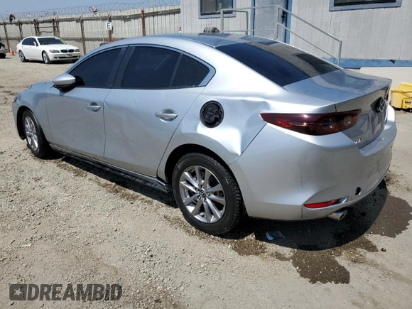2019 Mazda 3 with VIN 3MZBPABL8KM112754, listed as a Copart auction lot 60616045 with 77,292 mi miles and Clean title. Bid and sale history available at DreamBid. Image 2.