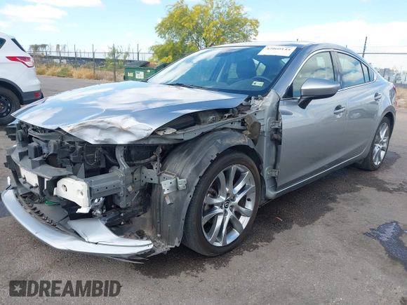 2014 Mazda 6 i Grand Touring с VIN JM1GJ1W57E1104801, выставлен на аукционе IAAI как лот 42060144 с пробегом 95 212 миль миль и . История ставок и продаж доступна на DreamBid. Изображение 18.