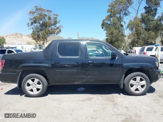 2011 Honda Ridgeline RTL with VIN 5FPYK1F50BB001442, listed as a IAAI auction lot 42023615 with 189,170 mi miles. Bid and sale history available at carsss.com. Image 13.