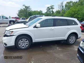 2019 Dodge Journey SE with VIN 3C4PDCBB6KT833777, listed as a IAAI auction lot 42411738 with 32,133 mi miles and . Bid and sale history available at DreamBid. Image 14.