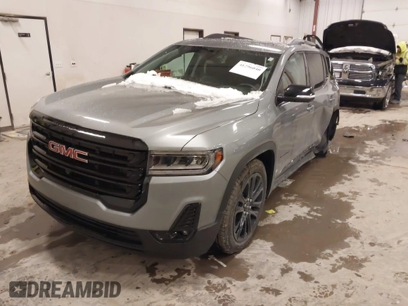 2023 GMC Acadia SLT with VIN 1GKKNULSXPZ263525, listed as a IAAI auction lot 41296040 with 8,631 mi miles and . Bid and sale history available at DreamBid. Image 2.