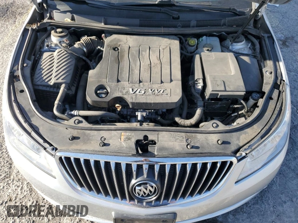 2013 Buick LaCrosse z VIN 1G4GA5E3XDF203438, wystawiony jako Copart lot #54271625 z przebiegiem 63 116 mil mil oraz Szkoda całkowita • Salvage title. Historia ofert i sprzedaży dostępna na DreamBid. Obrazek 11.