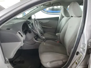 2010 Toyota Corolla with VIN 1NXBU4EE1AZ206765, listed as a Copart auction lot 60996215 with 196,623 mi miles and Salvage title. Bid and sale history available at DreamBid. Image 7.