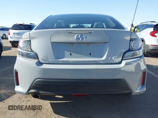 2015 Scion tC with VIN JTKJF5C7XFJ012872, listed as a IAAI auction lot 42128621 with 100,832 mi miles. Bid and sale history available at carsss.com. Image 17.